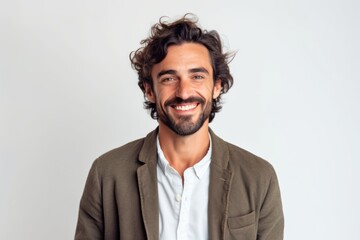 Obraz premium Portrait of a handsome young man smiling at camera over white background