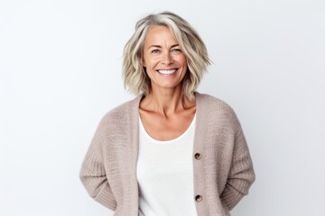 Portrait of smiling mature woman looking at camera isolated on a white background