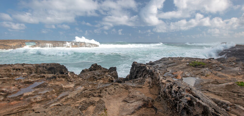 Winter storm waves crashing into Laie Point on the North Shore of Oahu Hawaii United States