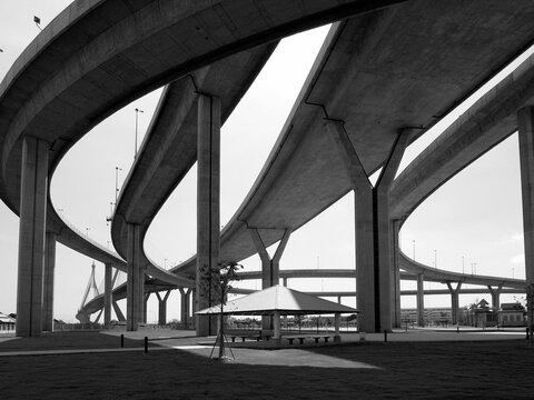 Motorway bridges in all directions in Bangkok, Thailand. Black and white photo.