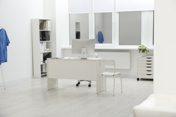 Stylish medical office interior with doctor's workplace