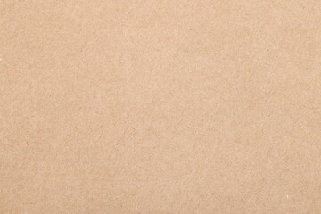 Texture of beige paper sheet as background, top view