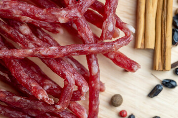 Dried pork sausage during slicing