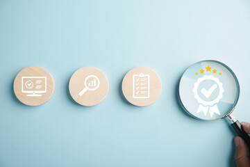 Magnifying glass showcases an aligned icon symbolizing quality assurance certificate, emphasizing...