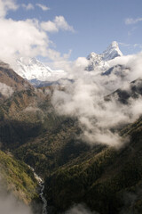 The trail from Namche Bazar to Phunki Tenga, Nepal. You can see Ama Dablam to the right and in the...