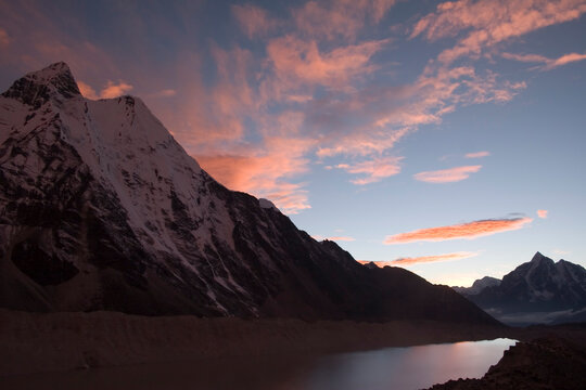 Sunset over Ama Dablam and Taboche Peak from Imja Tsho