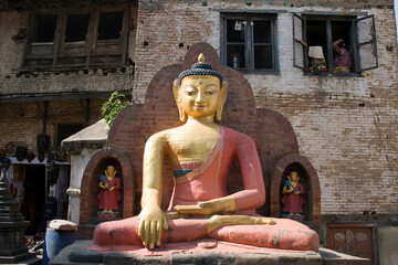This statue of Buddha is located at the Swayambhunath Temple in Kathmandu, Nepal. This Buddha is...