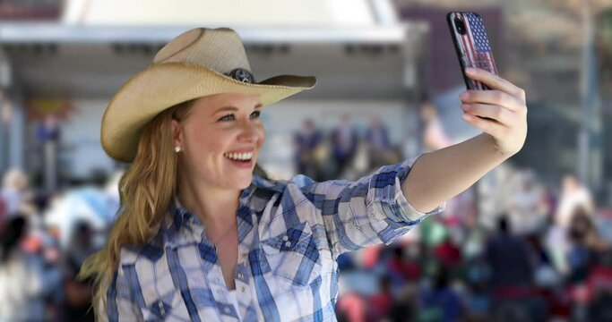 Cowgirl at Concert Takes a Selfie