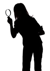isolated on white silhouette of woman with magnifying glass