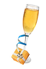 Isolated champagne glass and golden gift box with blue streamer