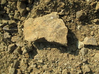 land taken from the mountains to level the ground in front of the house