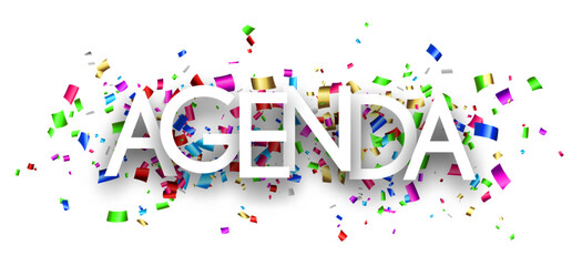 Agenda sign over colorful cut out foil ribbon confetti background.