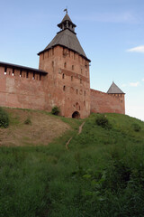 Fototapeta na wymiar Tower of Kremlin and in Velikiy Novgorod, view from defence ditch