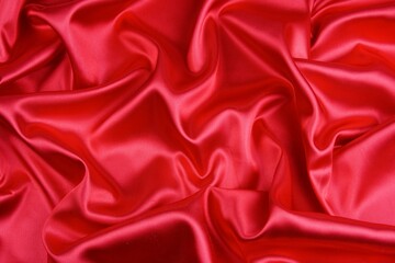 Clean folds red satin fabric, can use for background.