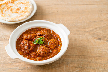 chicken tikka masala spicy curry meat food with roti or naan bread - obrazy, fototapety, plakaty
