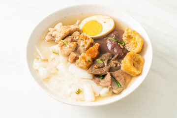 paste of rice flour or boiled Chinese pasta square in clear soup