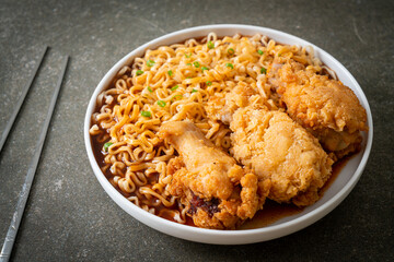 Korean instant noodles with fried chicken or Fried chicken ramyeon