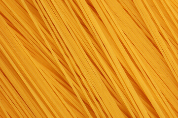 uncooked spaghettis background