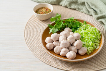pork meatball with vegetable and spicy sauce