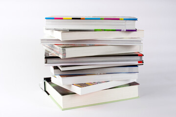 A stack of books against a plain background