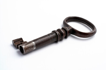 Old key on white background. Macro