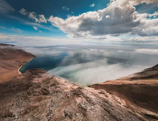 Foto auf Glas Beautiful shore of Baikal lake, cloud over the water. © smallredgirl