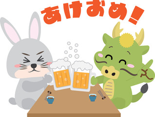 忘年会、新年会などの宴会でビールで乾杯する龍とうさぎ