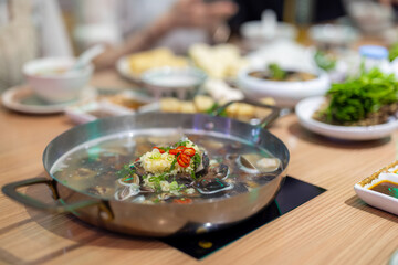 Seafood clam hot pot together at restaurant
