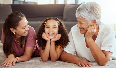 Happy, generations and smile with family on floor of living room for bonding, relax and love in house. Happiness, portrait and grandmother with young child, mom and home for fun, support and together