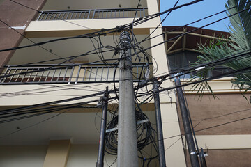 Wire and cable clutter, The chaos of cables and wires on every street in Legian, Kuta.