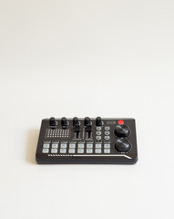 Top view of an audio interface or a sound card isolated on white background. 