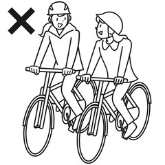 自転車で並走する若い女性たち