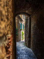 The romantic narrow medieval alleys of Pienza in Tuscany