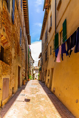 The romantic narrow medieval alleys of Pienza in Tuscany