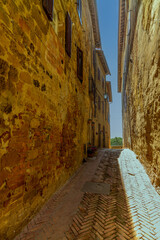 The romantic narrow medieval alleys of Pienza in Tuscany