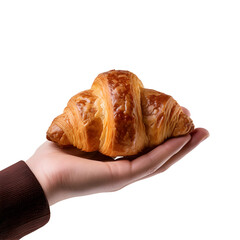 Creative food composition. Hand holding a Beautiful whole croissant isolated on white background. flat lay top view. macro close up