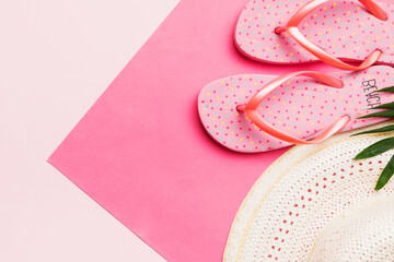 Summer vacation concept flat lay. straw hat beach accessories and flip flop top view. Space for text. travel concept