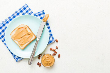 Peanut butter sandwiches or toasts on light table background.Breakfast. Vegetarian food. American cuisine top view vith copy space