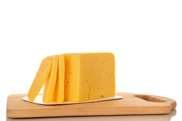 Sliced piece of cheese on a wooden kitchen board, macro, isolated on white background.