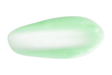 A dab of fresh light green cream or cucumber face mask. With granules and flecks. On a white background