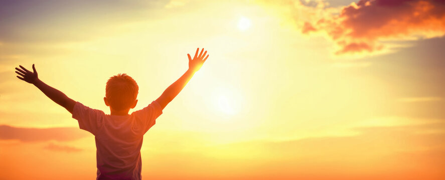Boy raising hands over sunset sky, enjoying life and nature. Happy Kid in mountains looking on sun. Silhouette of child in sunlight rays. copy space. Generative AI
