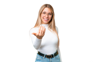 Young pretty blonde woman over isolated chroma key background inviting to come with hand. Happy that you came