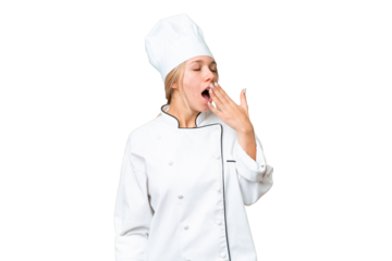 Young chef woman over isolated chroma key background yawning and covering wide open mouth with hand