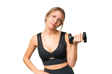 Blonde sport woman making weightlifting over isolated chroma key background with sad expression
