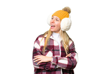 Young pretty blonde woman wearing winter muffs over isolated chroma key background happy and smiling