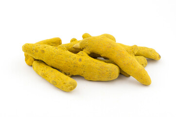 Turmeric root and powder on a white background close-up isolated. Useful spices, Indian roots and herbs. Medicinal folk ingredients for food.