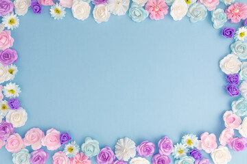 Pink Flowers Frame with blue copy space background
