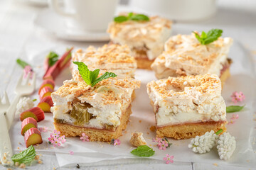 Sweet rhubarb yeast cake served with tea.
