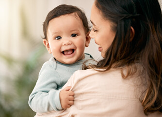 Portrait, baby and mother hug with love, smile and playing during morning bonding routine in their...