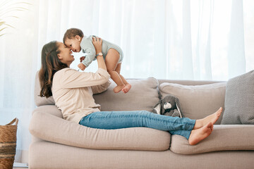 Airplane, love and mother with baby on a sofa for games, playing and laughing in their home together. Family, smile and mom with girl toddler on a couch, relax and flying, fun and hug in living room